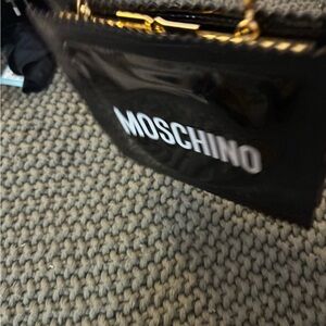 Moschino hand 100% Authentic lightly worn